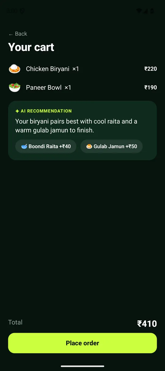 Cart screen of the app with an AI recommendation suggesting raita and gulab jamun